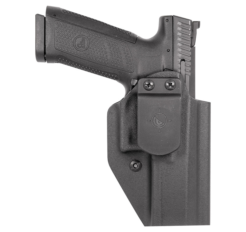 Black handgun in polymer holster on white background