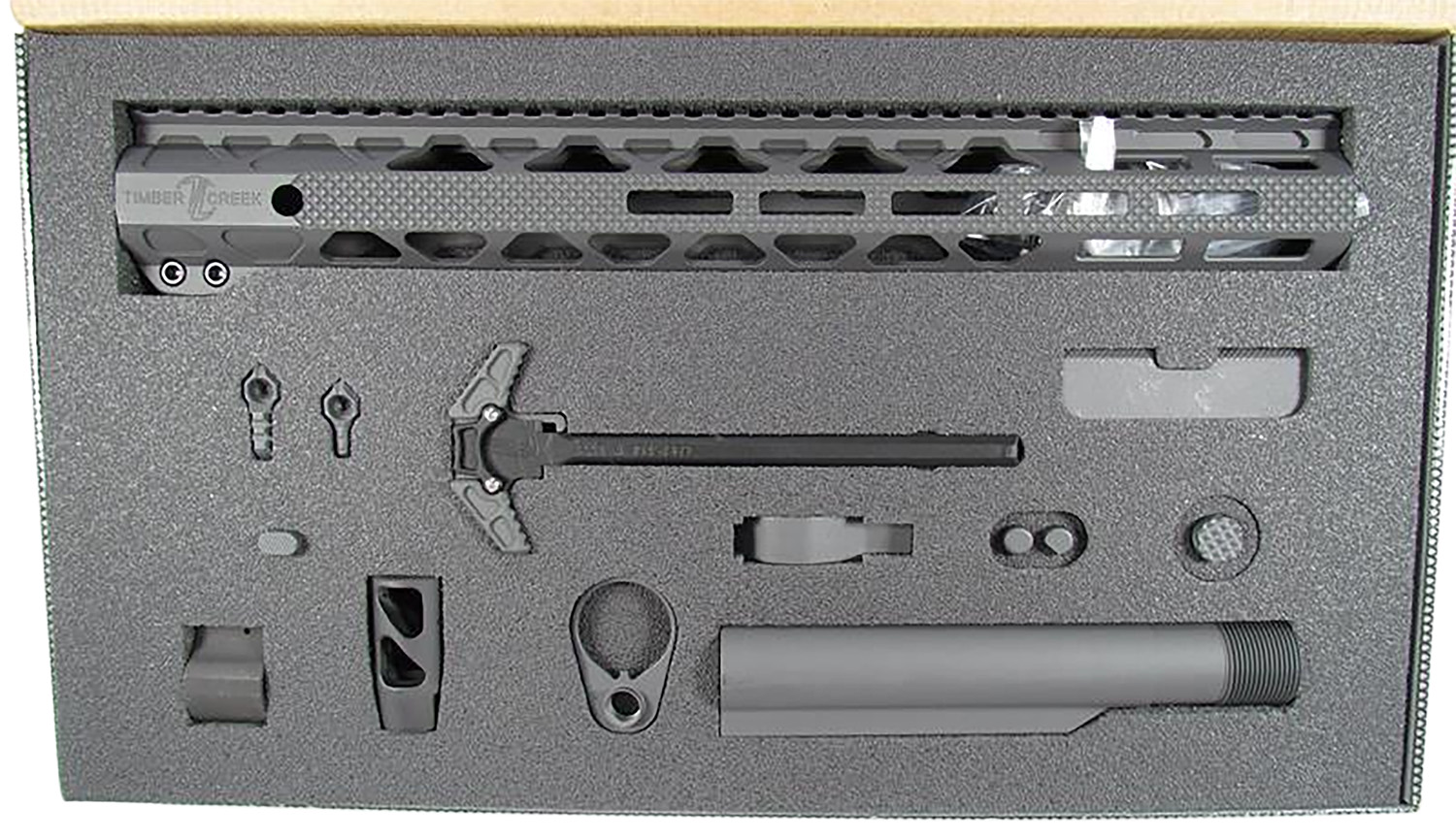 AR-15 components arranged in foam case