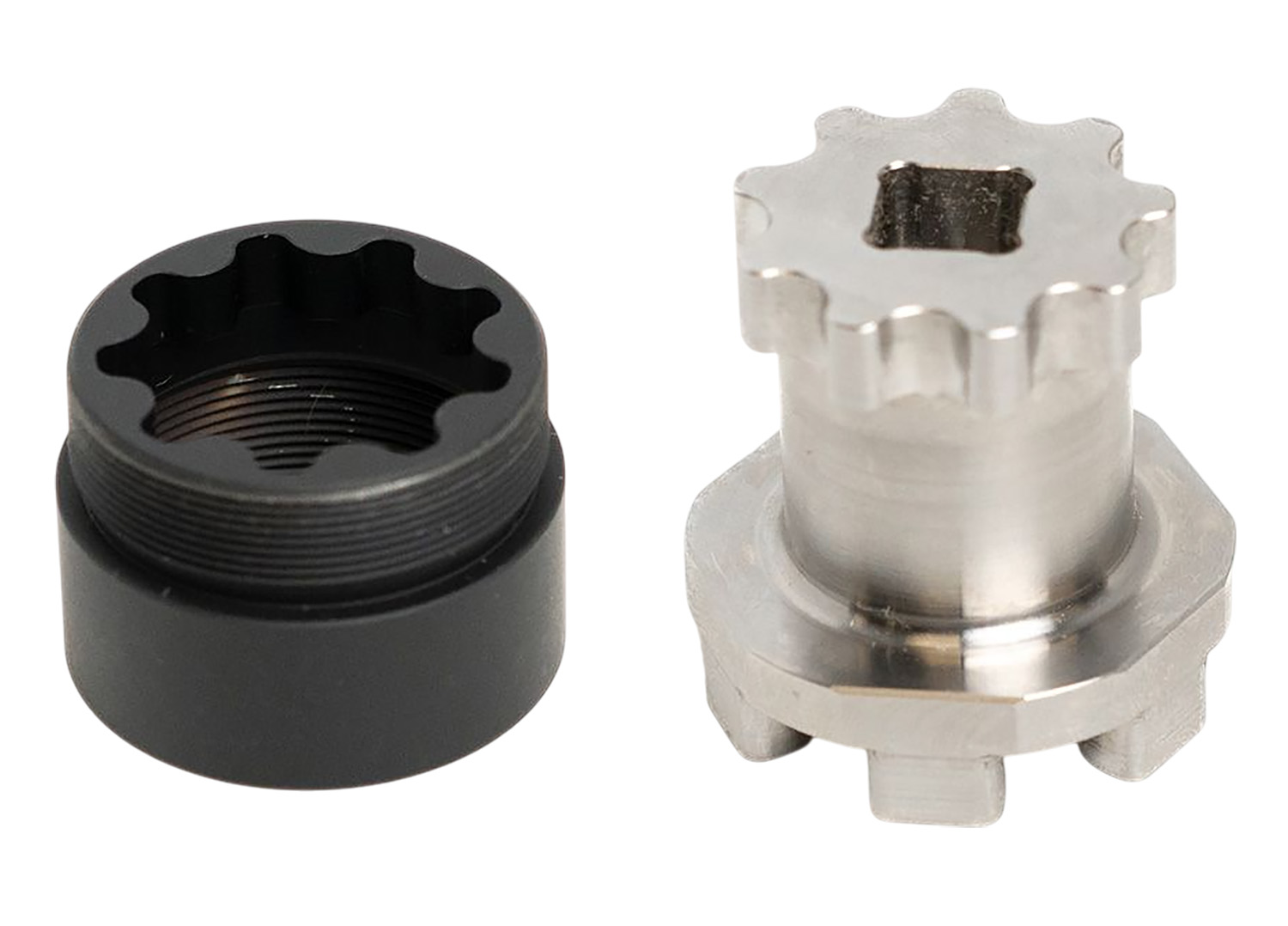 Two metal splined mechanical components side by side