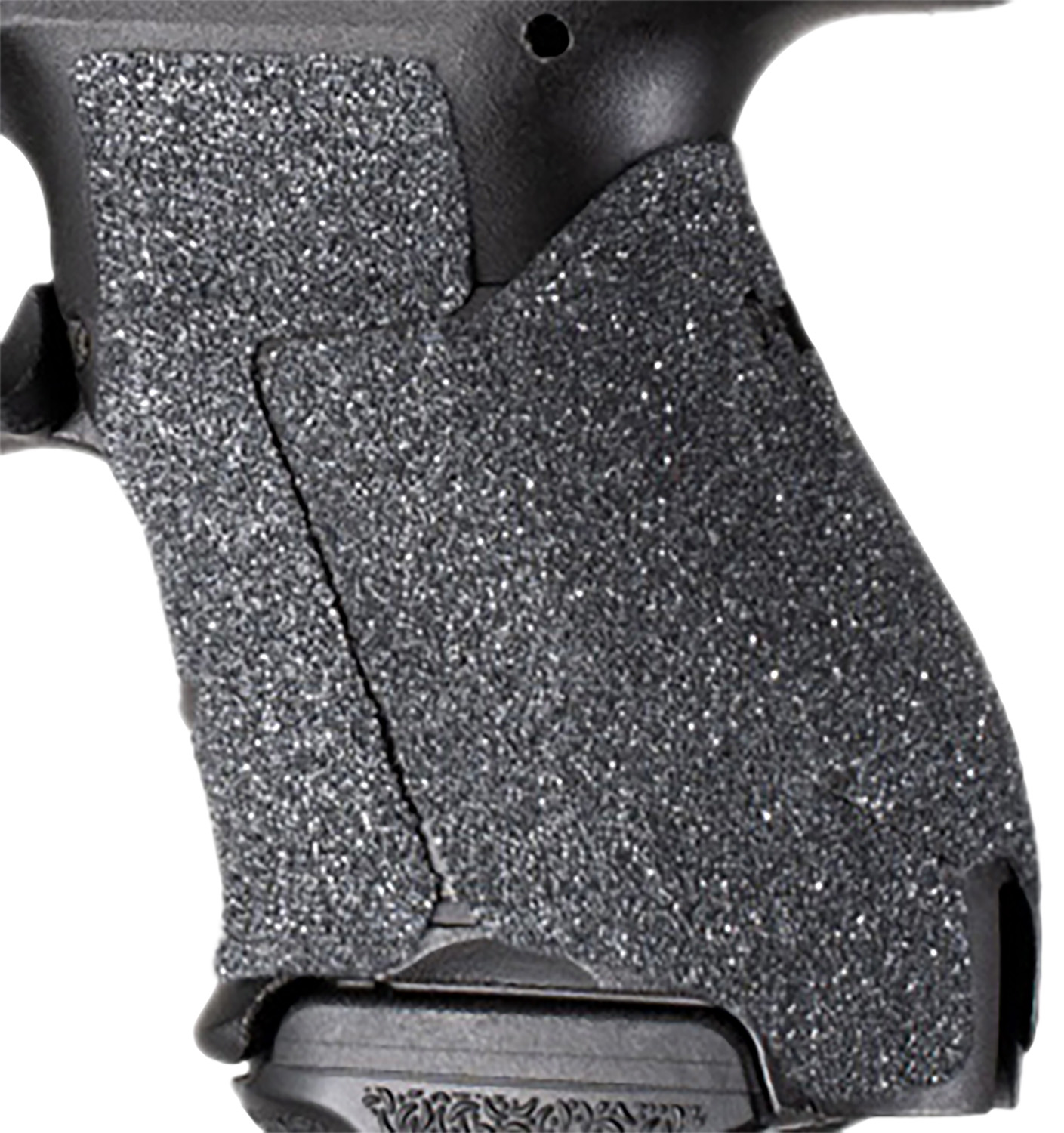 Close-up of handgun grip with textured tape