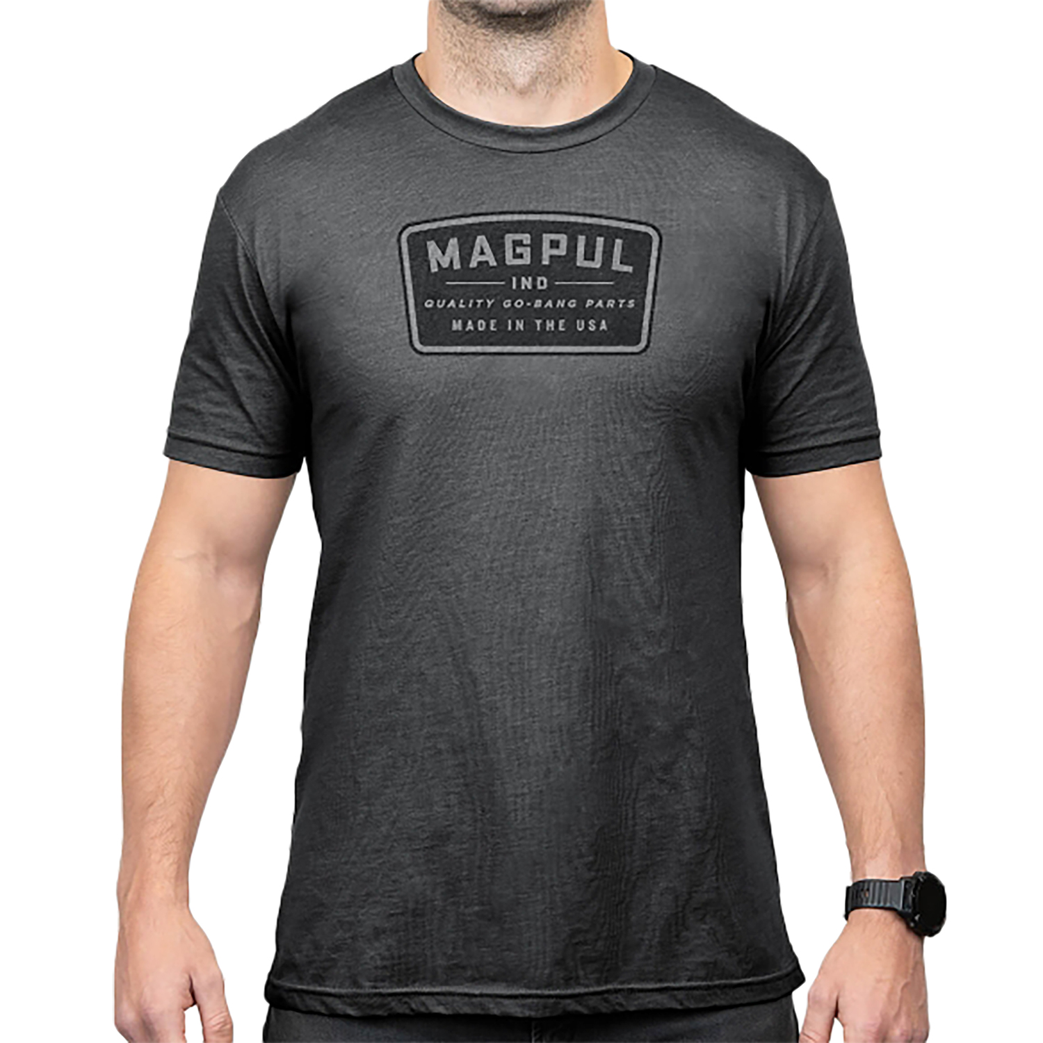 Man wearing dark gray MAGPUL logo T-shirt