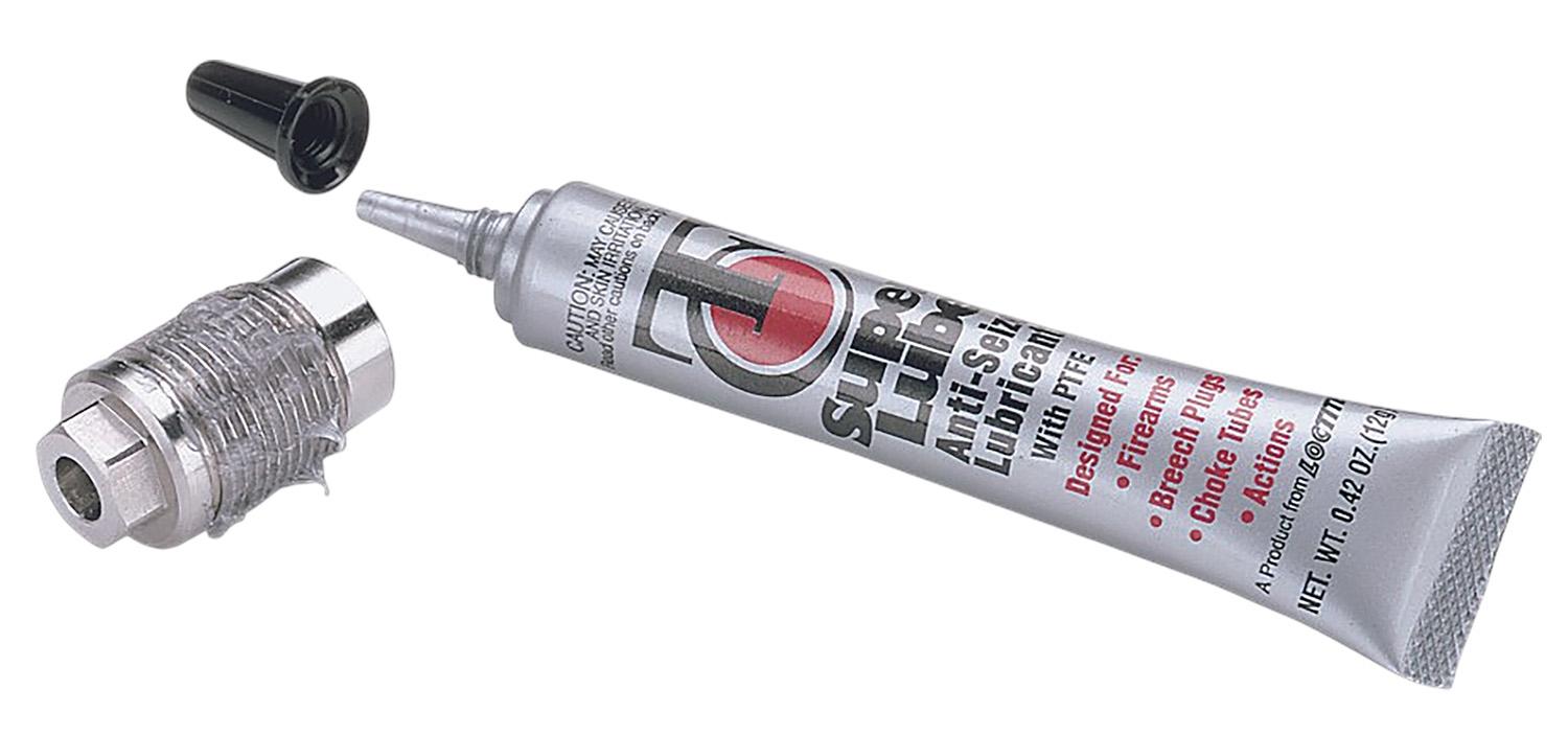 Tube of anti-seize lubricant and spark plug
