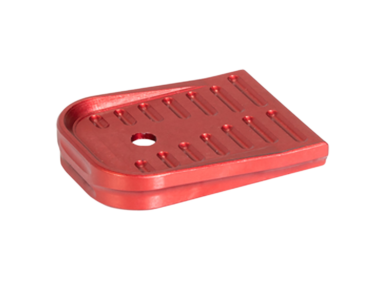 Red anodized metal plate with grooves and hole