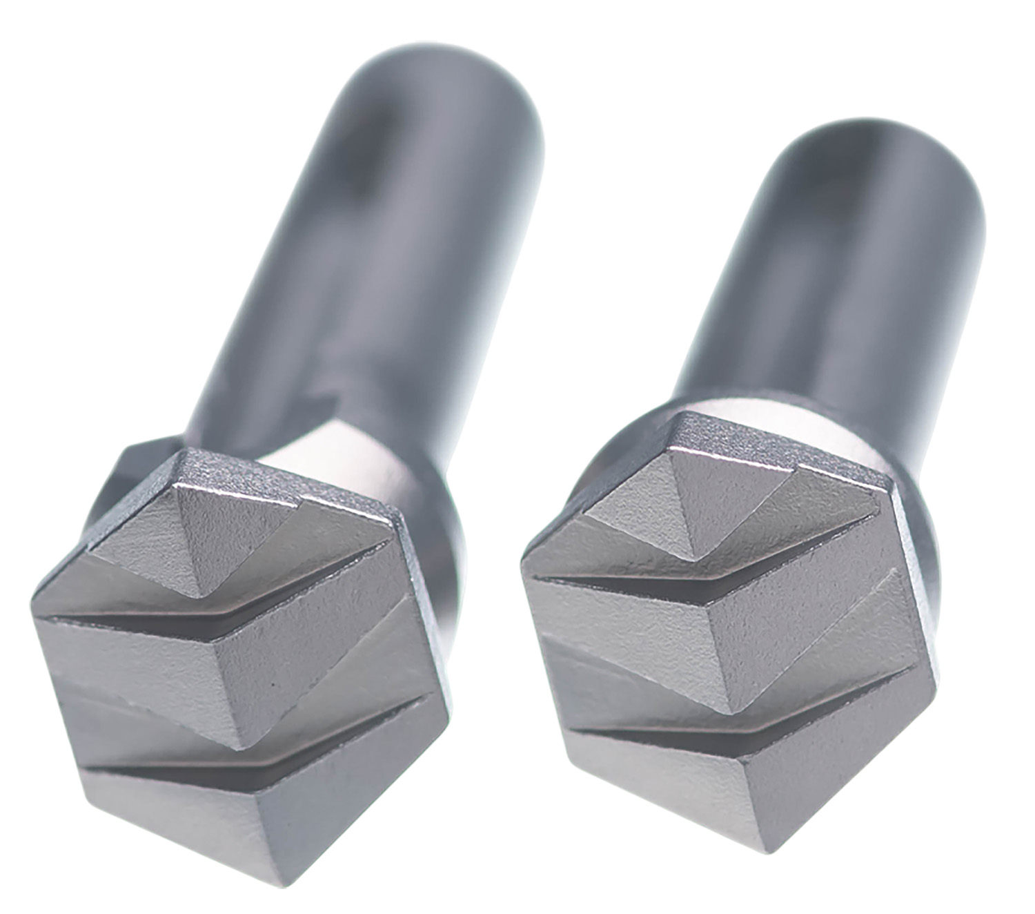 Two metal chamfering tools with square pyramid tips