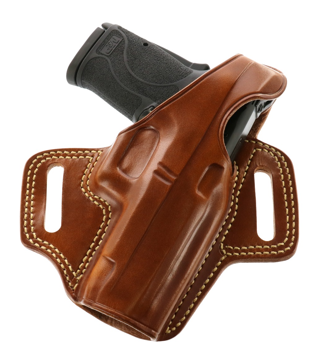 Handgun in brown leather belt holster