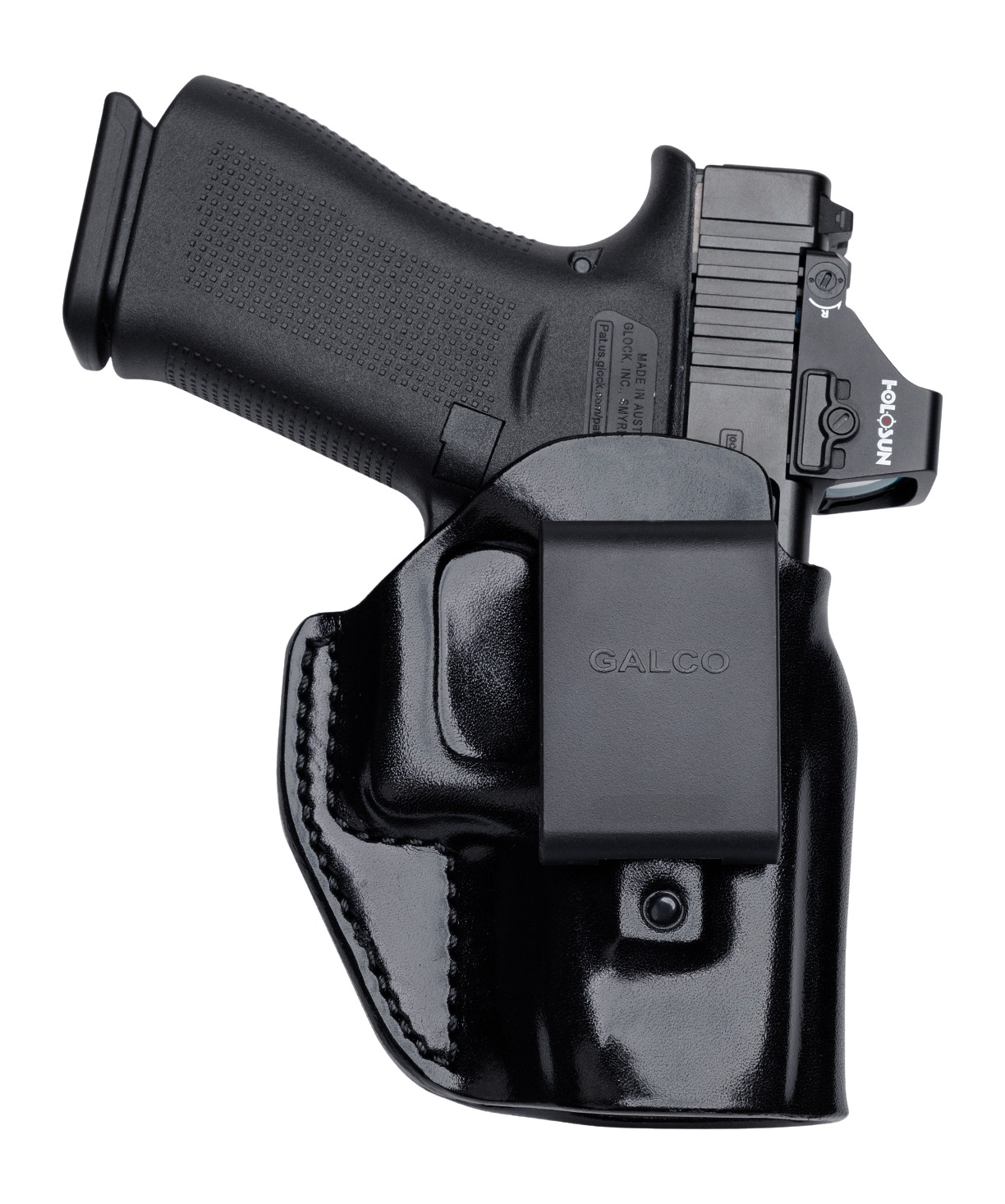Handgun in black leather holster with optic