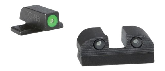 Black pistol sights with green and white dots