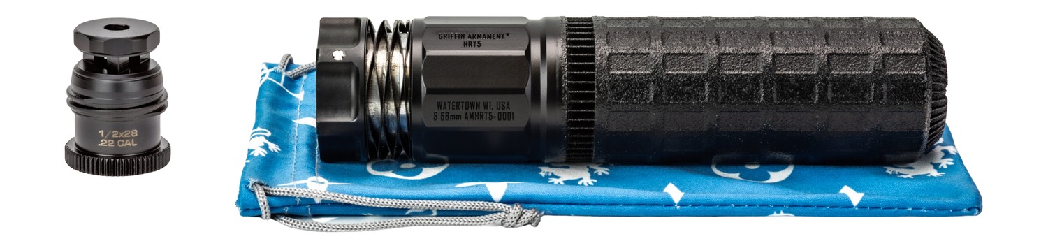 Black firearm suppressor and thread adapter on pouch