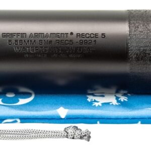 Black firearm suppressor and threaded adapter on pouch