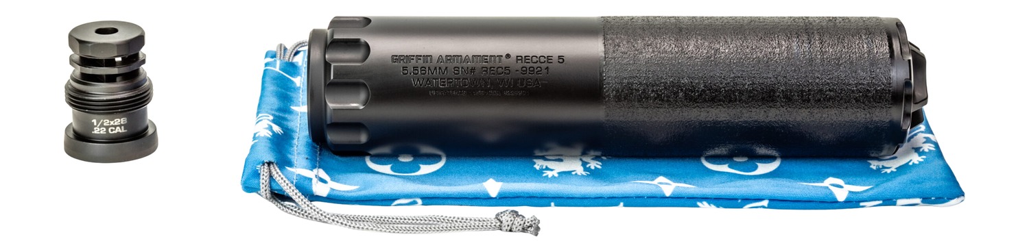 Black firearm suppressor and threaded adapter on pouch