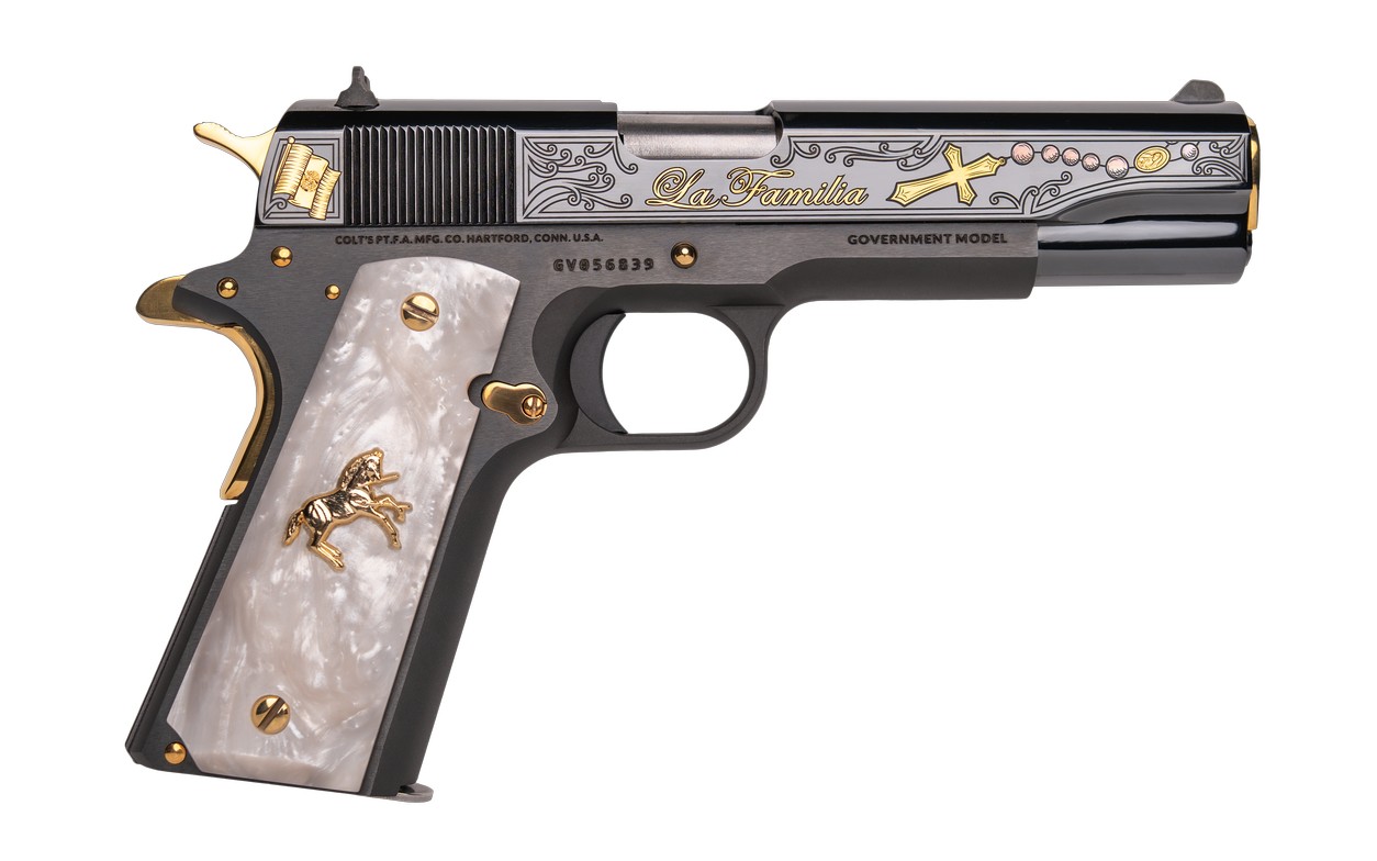 Engraved Colt 1911 pistol with pearl grip