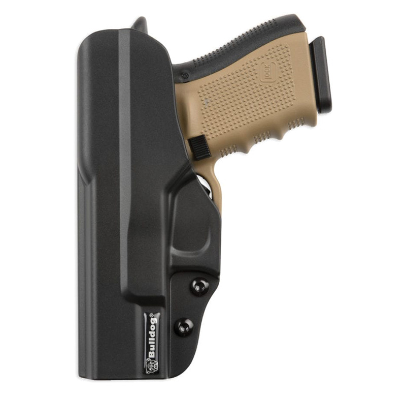 Handgun in black holster on white background