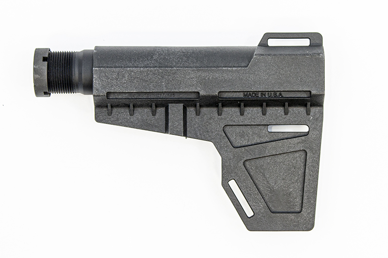 Black adjustable firearm stock component on white background