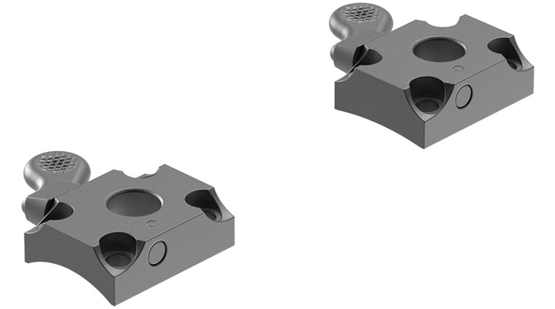 Two gray metal mechanical mounting blocks