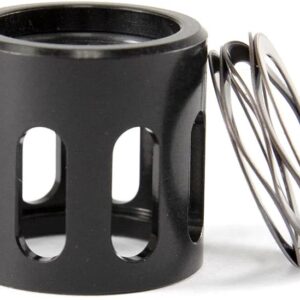 Black cylindrical metal component with coil spring