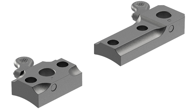 Two machined metal components with drilled holes