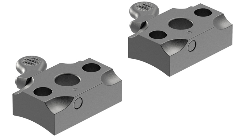 Gray metal clamping block with multiple holes