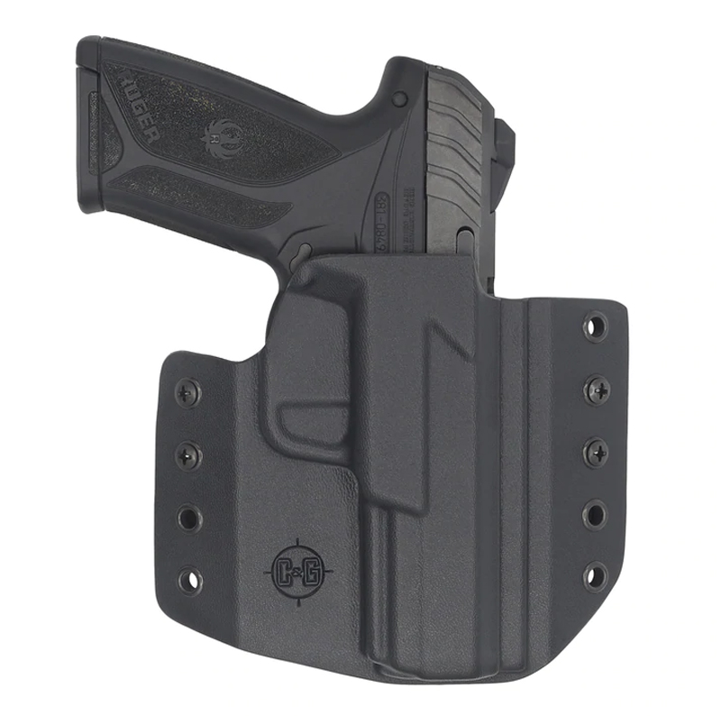 Black handgun in molded holster