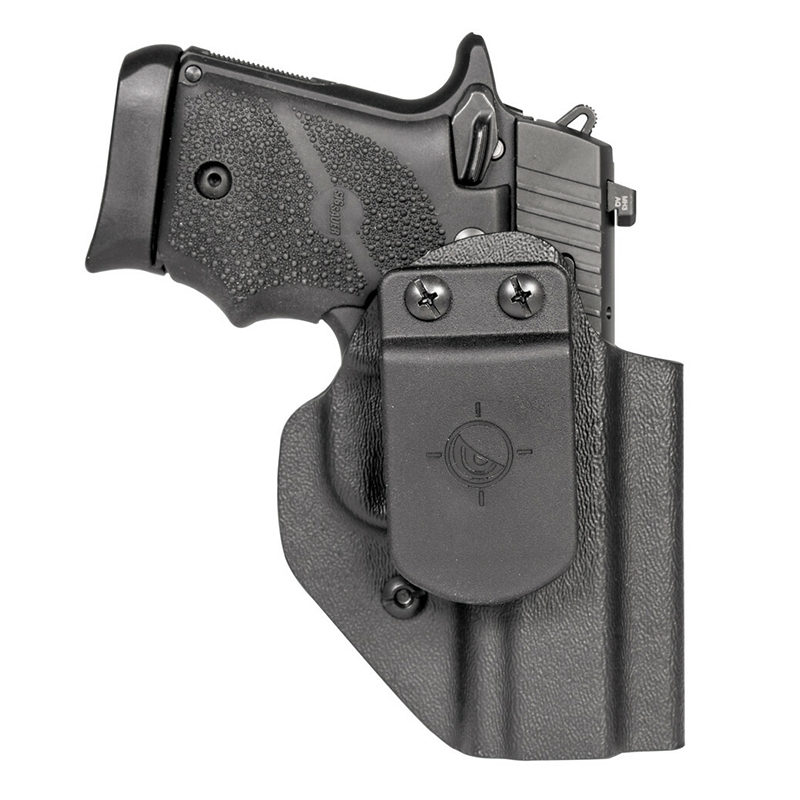 Compact handgun in black concealed carry holster