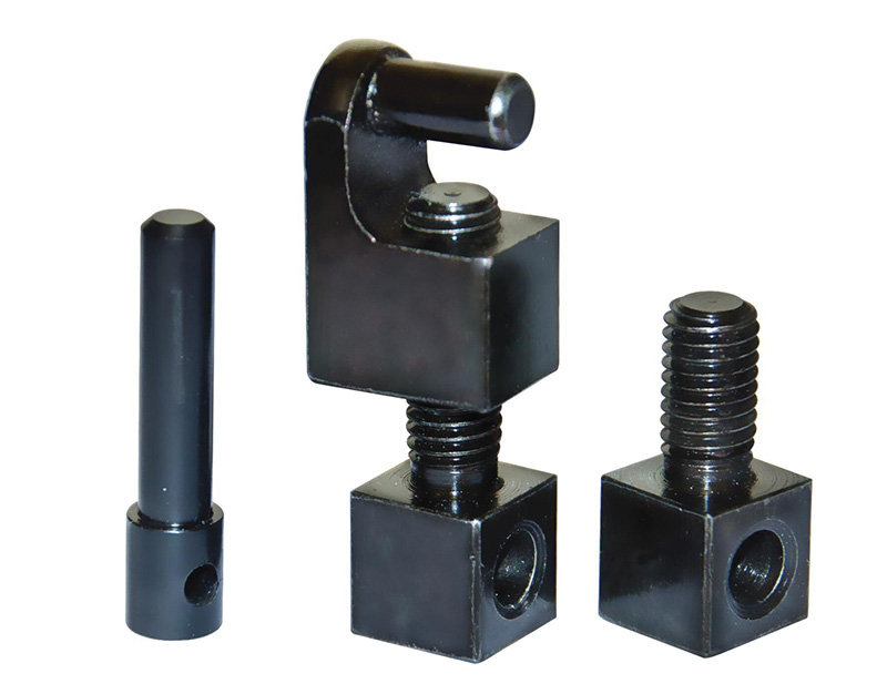 Black metal clamp components with threaded bolts