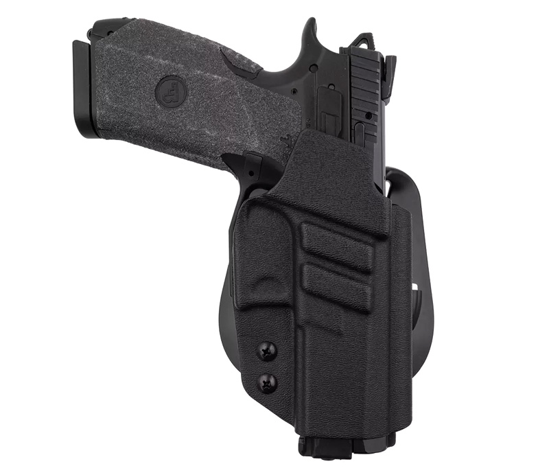 Black semi-automatic pistol in fitted holster