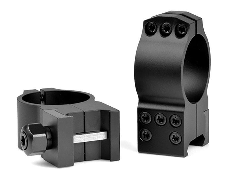 Black rifle scope mounting rings on white background