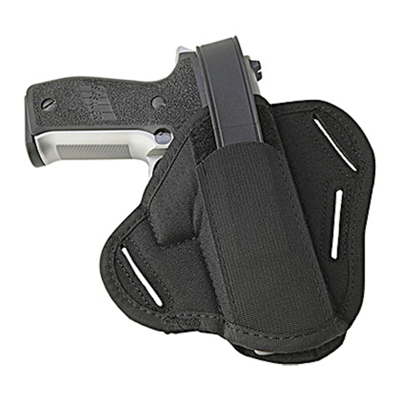 Handgun secured in black belt holster
