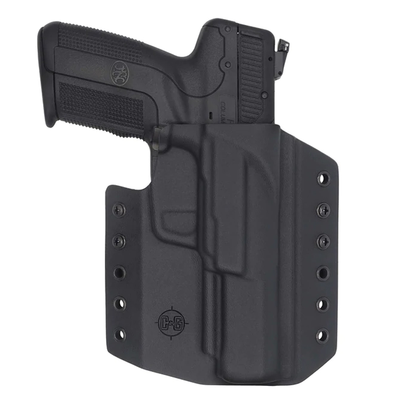 Black handgun in Kydex holster on white background