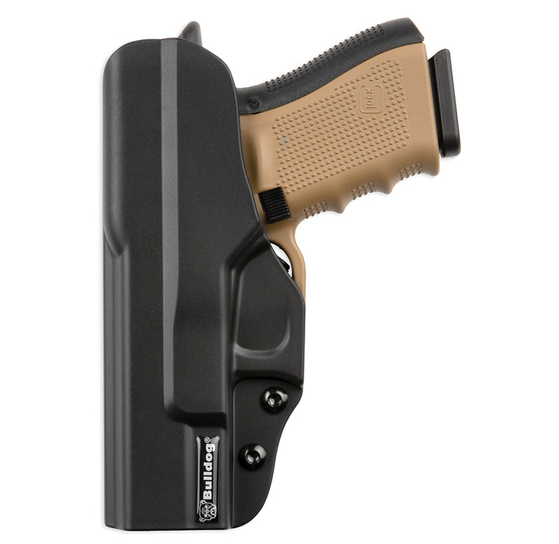 Handgun in black holster, side view