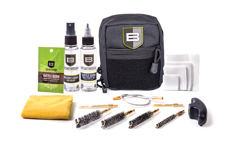 Gun cleaning kit with solvents, brushes, and pouch