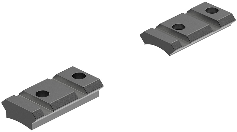 Two gray machined metal mounting blocks with holes