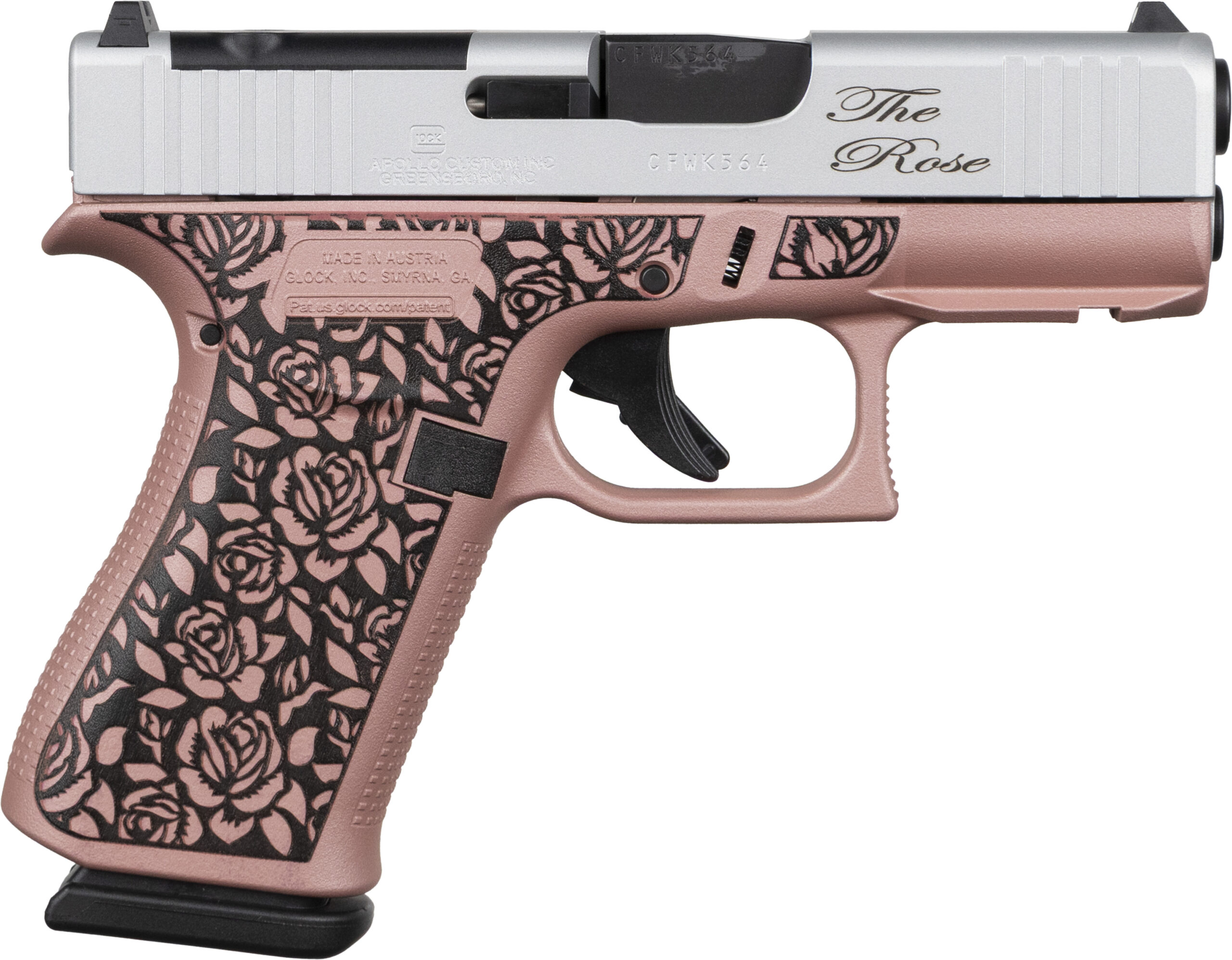 Rose gold handgun with black floral engraving