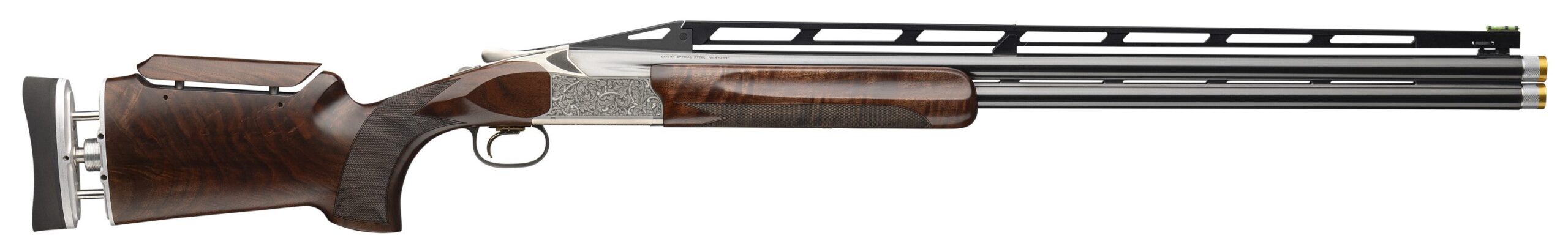 Over-under shotgun with wooden stock and engraving