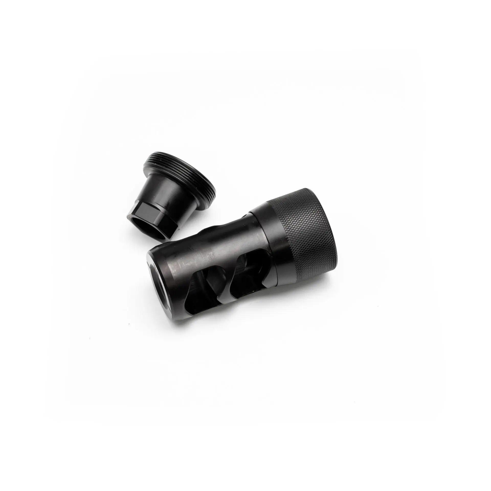 Black metal muzzle brake with threaded cap