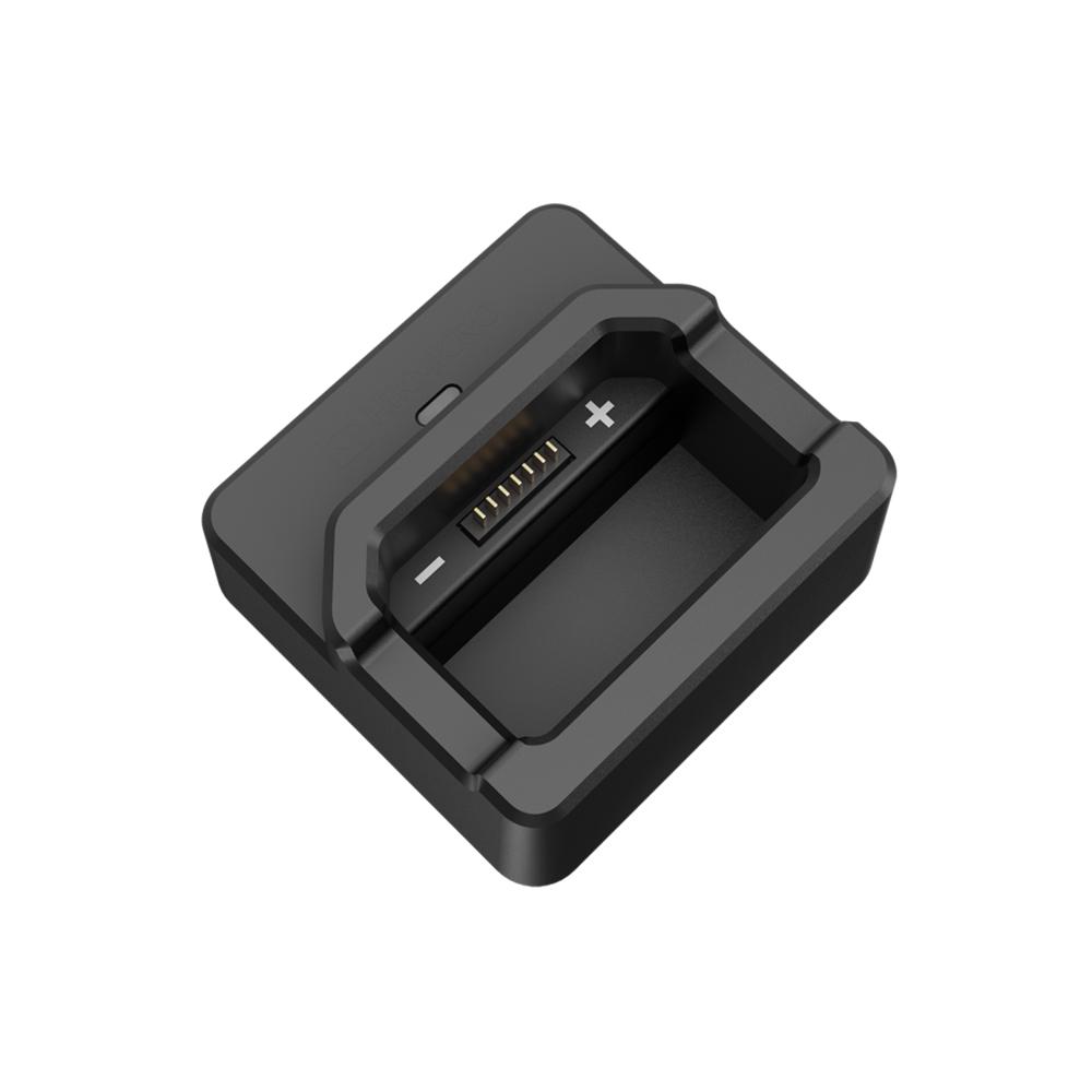 Black charging dock with metal connector pins
