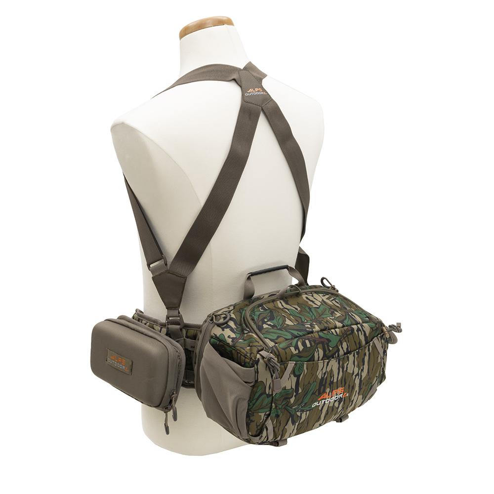 Camouflage chest pack with shoulder harness on mannequin