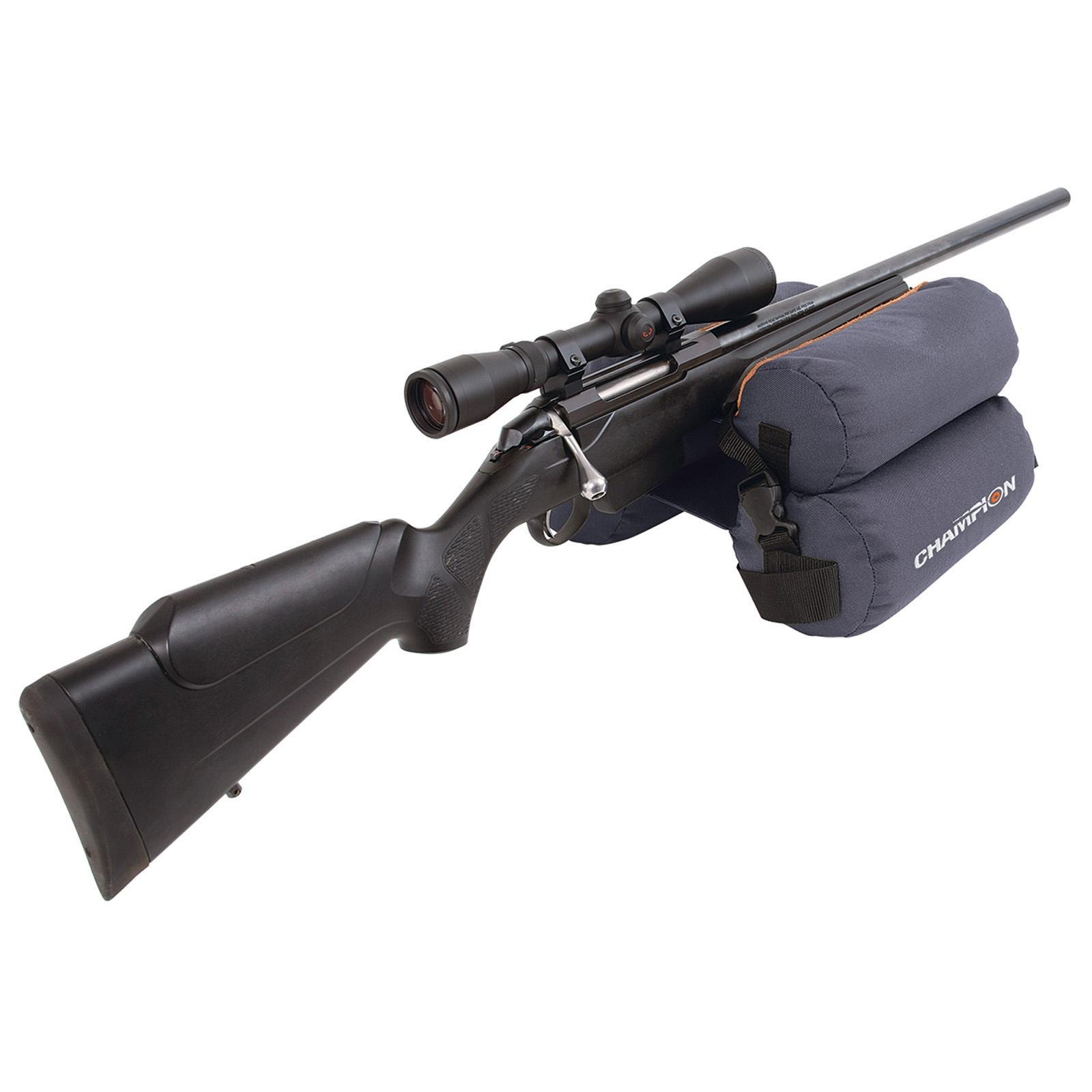 Bolt-action rifle with scope on shooting rest