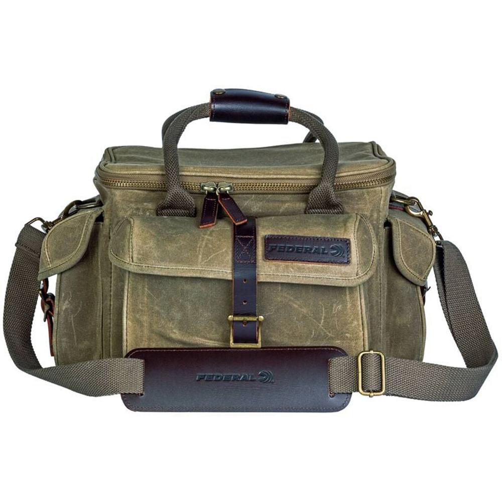 Olive canvas duffel bag with leather straps