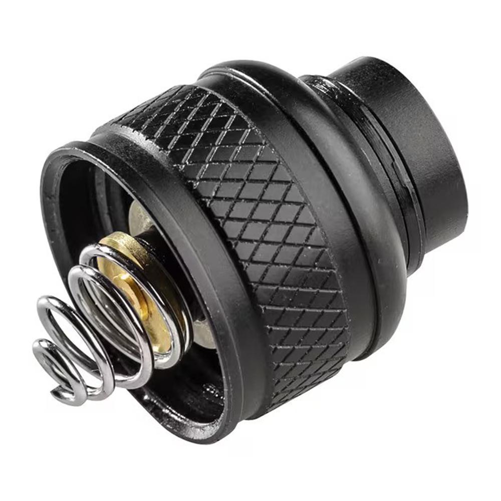 Black metal cap with internal spring mechanism