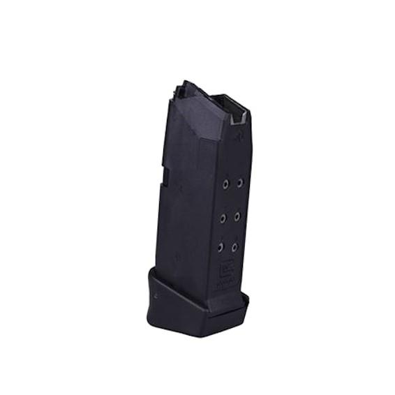 Black handgun magazine on white background