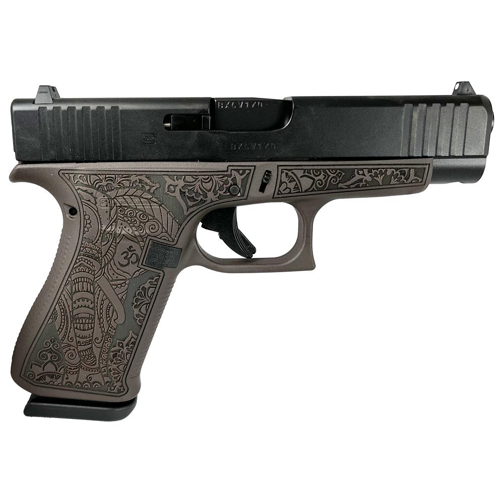 Engraved semi-automatic pistol with ornate elephant grip