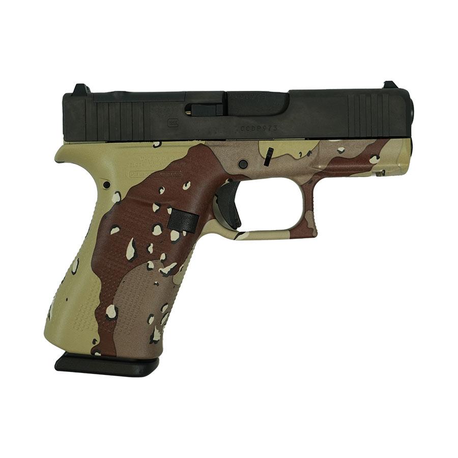 Desert camouflage semi-automatic handgun on white background