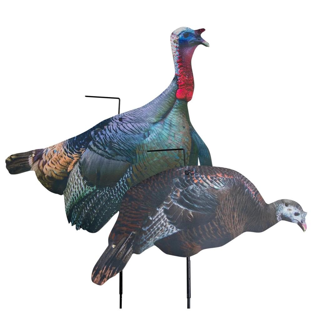 Two turkey decoys on stakes