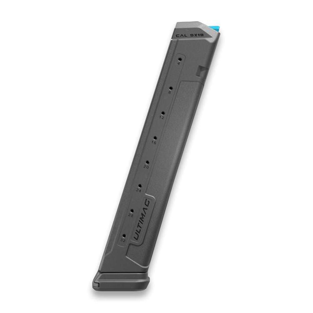 Extended pistol magazine on white background