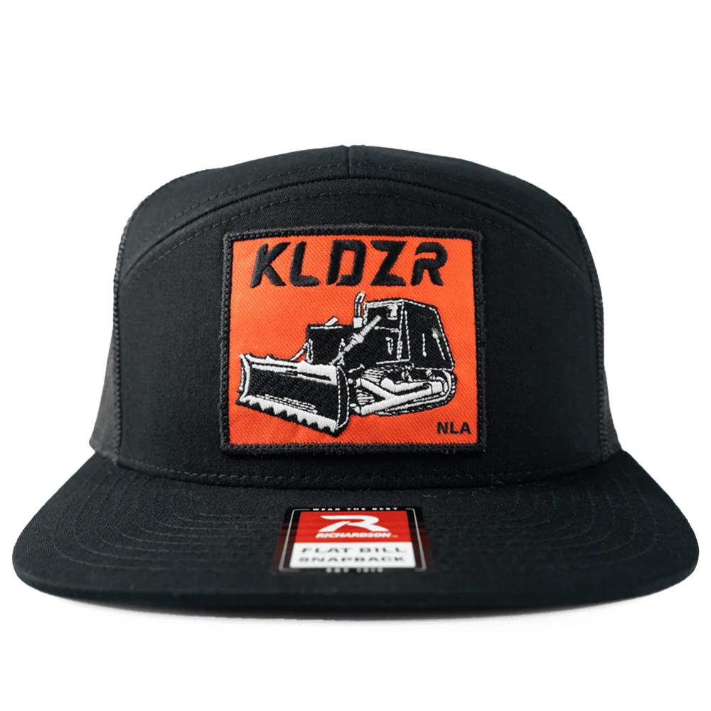 Black snapback hat with bulldozer patch