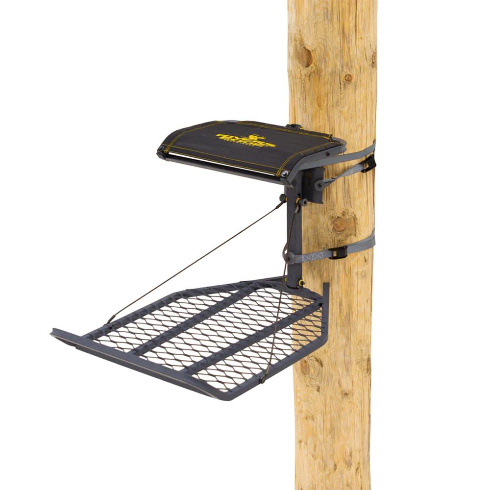 Foldable hunting tree stand mounted on tree trunk