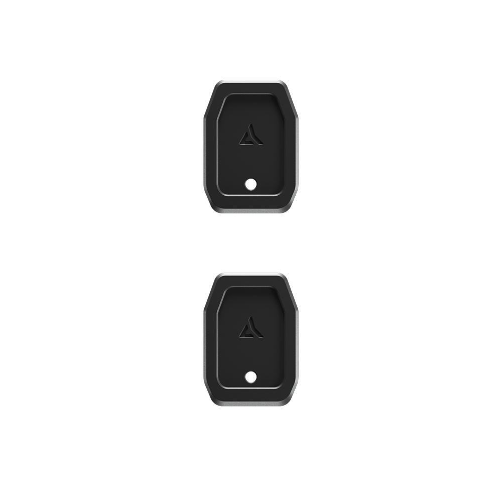 Two black rectangular electronic devices on white background