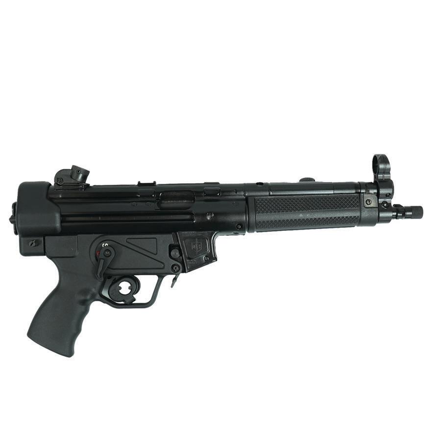 Compact black submachine gun on white background