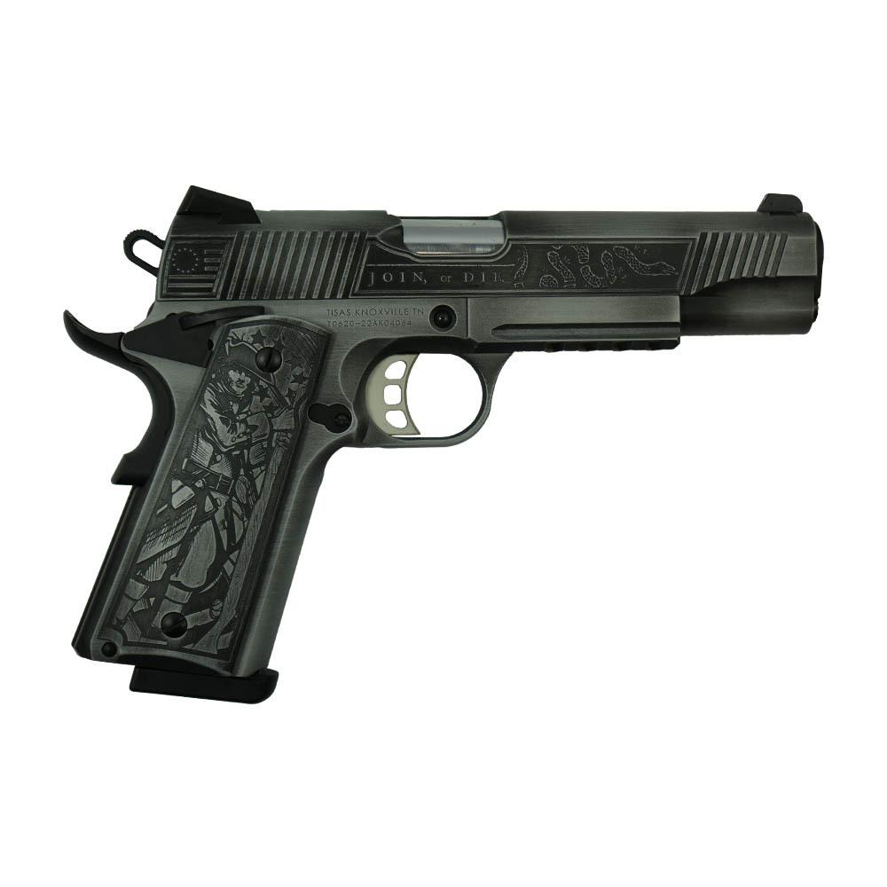 Engraved 1911-style semi-automatic pistol on white background