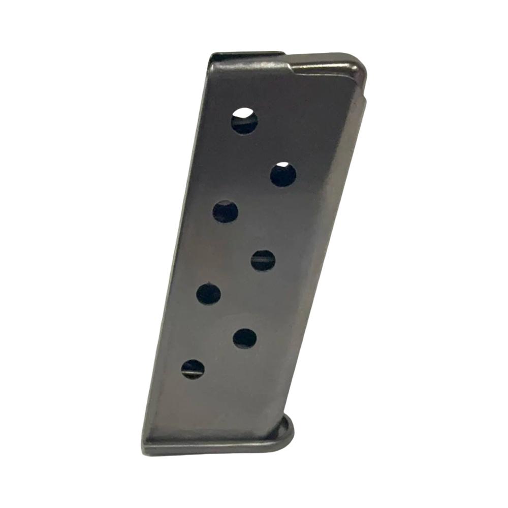 Metal handgun magazine on white background